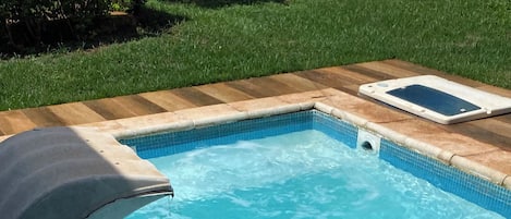 Outdoor pool, open 9:30 AM to 10:00 PM, sun loungers