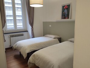 2 bedrooms, travel crib, WiFi, bed sheets