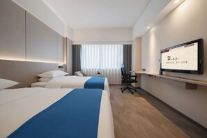 A hotel room with two beds, a desk, a chair, a TV, and a window with curtains. - Chengdu Eight Treasures Hotel(Kuanzhai Alley Luomashi Subway Station) (Chengdu)