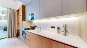 Microwave, stovetop, dishwasher, coffee/tea maker