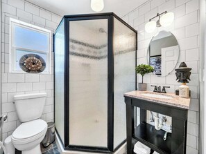 Shower, hair dryer, towels, soap