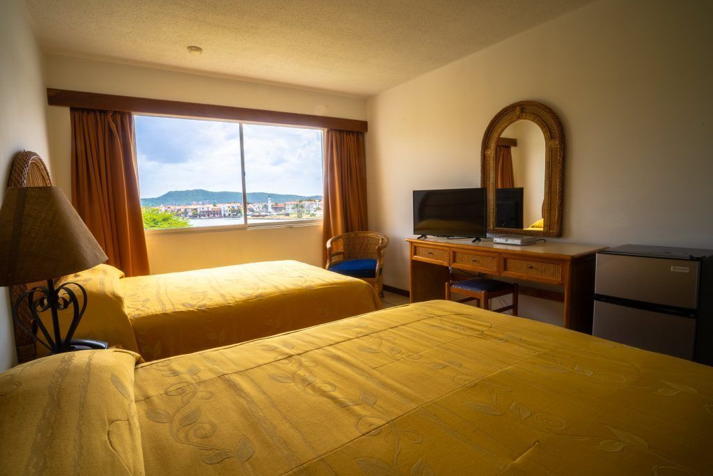 Chambre Triple Junior, vue piscine