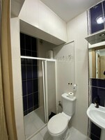 Shower, towels, soap, toilet paper