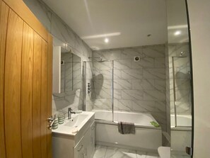 Hair dryer, towels, soap, toilet paper