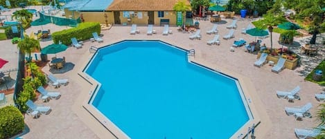 Outdoor pool, pool umbrellas, sun loungers