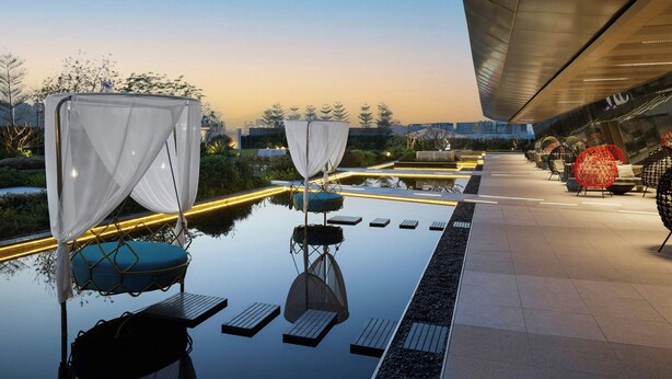 A rooftop terrace with a glass floor, outdoor seating, and a view of the city skyline. - Sheraton Grand Xiamen Jimei (Xiamen)