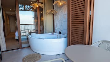 Eco-friendly toiletries, hair dryer, slippers, bidet
