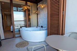 Eco-friendly toiletries, hair dryer, slippers, bidet