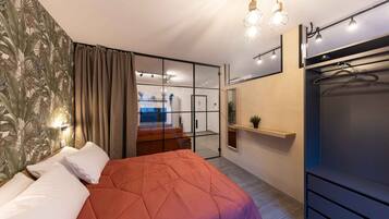 Departamento Deluxe, 2 camas Queen size, cocina, vista al patio | 1 habitación y wifi gratis