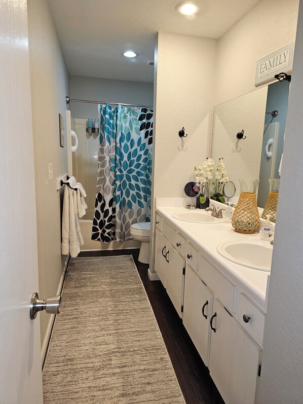 Hair dryer, towels, soap, shampoo