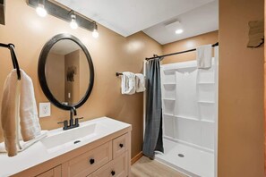 Shower, hair dryer, shampoo