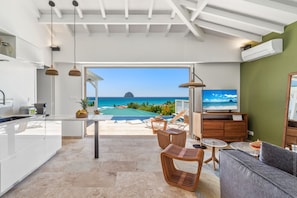 Enjoy unobstructed ocean views from this spacious living area, perfect for relaxation or entertaining.