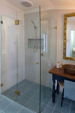 Shower, hair dryer, towels, soap
