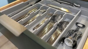 A drawer with utensils and kitchen tools. - DWELL in Alaska "BIGGER" Unit k (Fairbanks)