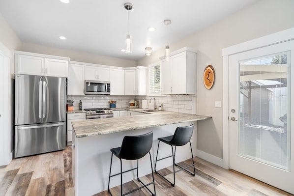 Fridge, microwave, dishwasher, coffee/tea maker