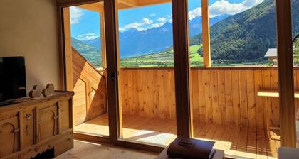 Appartement "Hoamisch" avec vue sur les montagnes, jardin privé et Wi-Fi
