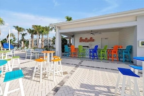Outdoor dining - Brand New Home at Windsor Cay Resort with Lazy River (Clermont)