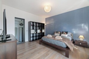 2 dormitorios, tabla de planchar con plancha, wifi gratis y ropa de cama