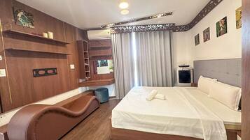 Deluxe Apartment, 1 Queen Bed, Balcony, Sea View | 1 bedroom, free minibar items, free WiFi, bed sheets