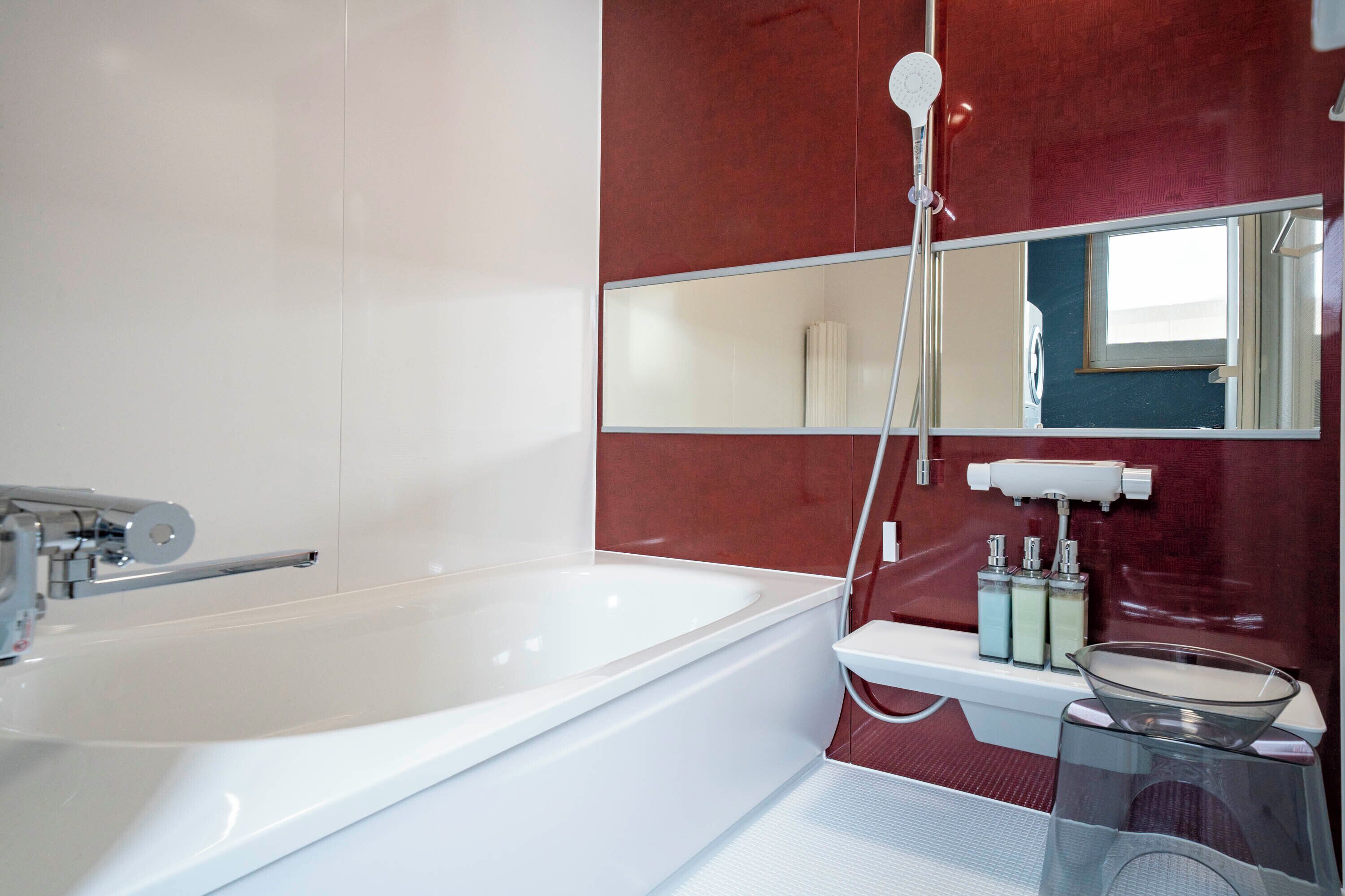 Hair dryer, slippers, bidet, towels