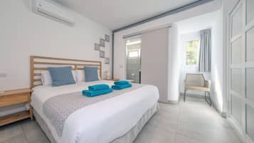 2 habitaciones, caja de seguridad en la habitación y escritorio