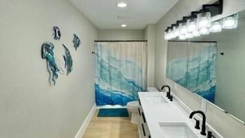 Shower, hair dryer, towels