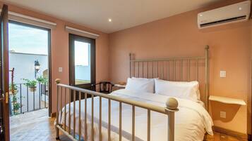Junior Suite, Courtyard View | 1 bedroom, premium bedding, in-room safe, blackout curtains