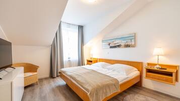 2 dormitorios, tabla de planchar con plancha, wifi y ropa de cama