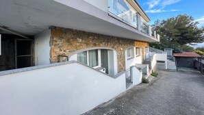 A two-story building with a stone facade and a flat roof. - Miramare 3 LUX - Total Sea View, Andora, Italy (Andora)