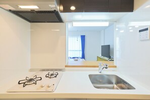 Apartment, Non Smoking (C) | Private kitchen