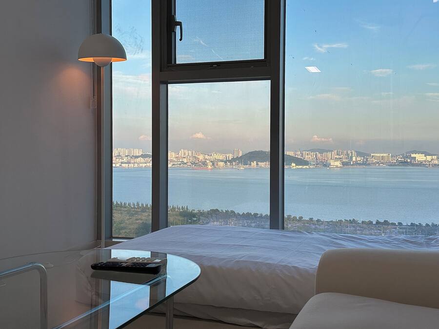 Deluxe Triple Room, Ocean View | Desk, laptop workspace, free WiFi