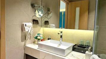 Shower, free toiletries, slippers, bidet