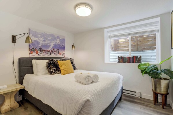 1 bedroom, desk, iron/ironing board, travel crib