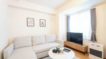 Căn hộ Deluxe | Khu phòng khách | TV màn hình phẳng