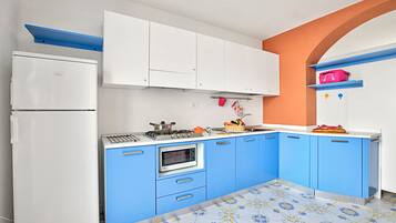 Standard Studio (Complesso Azzurro Mono 2 Near The) | Private kitchen | Fridge, microwave, stovetop, coffee/tea maker