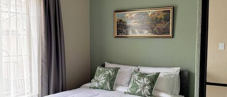 2 chambres, fer et planche à repasser, Wi-Fi, draps fournis