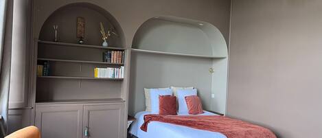 Premium bedding, blackout curtains, iron/ironing board (on request)