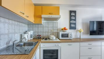 Apartemen Keluarga, 1 kamar tidur (Apartment Jakara 2) | Dapur pribadi | Lemari es, microwave, oven, dan kompor