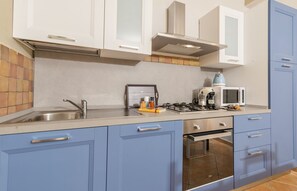 Standard Apartment, Multiple Bedrooms (Dimora Ametista) | Private kitchen | Fridge, microwave, oven, stovetop - Dimora Apartments (Arzachena)