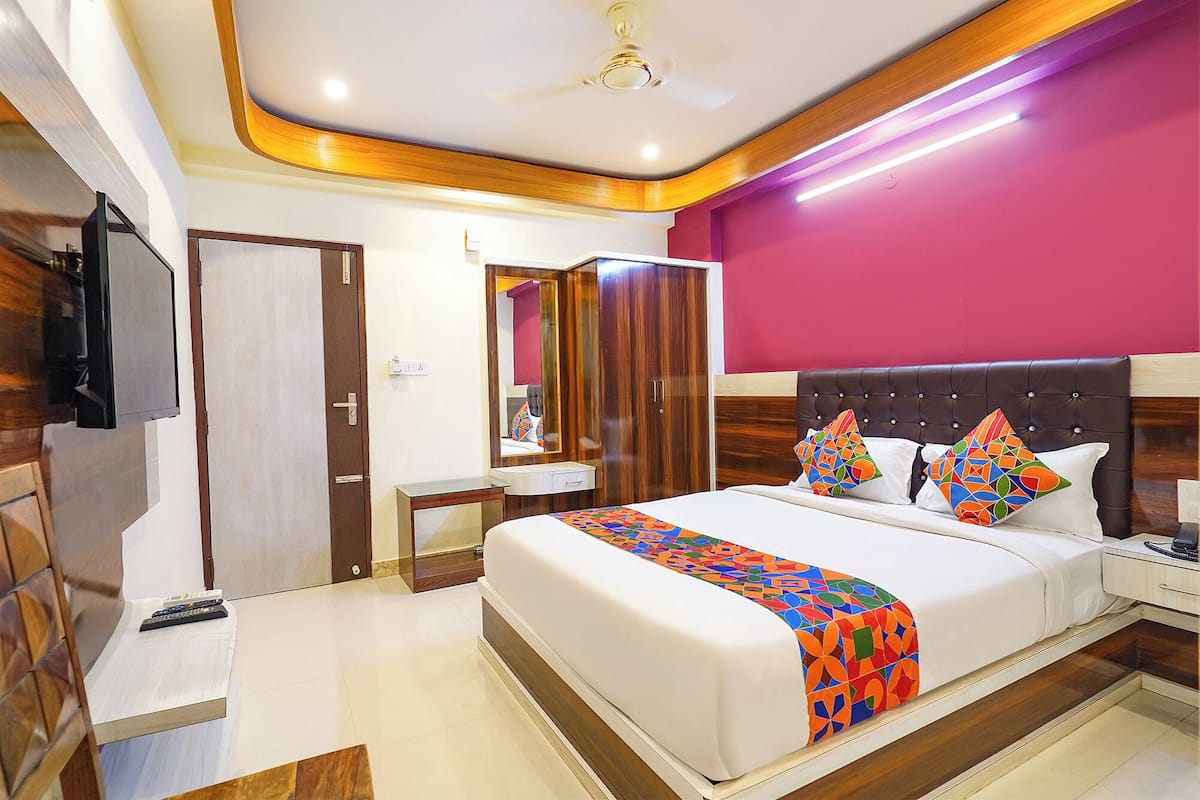 Deluxe kamer | Lakens van Egyptisch katoen, luxe beddengoed, een kluis op de kamer