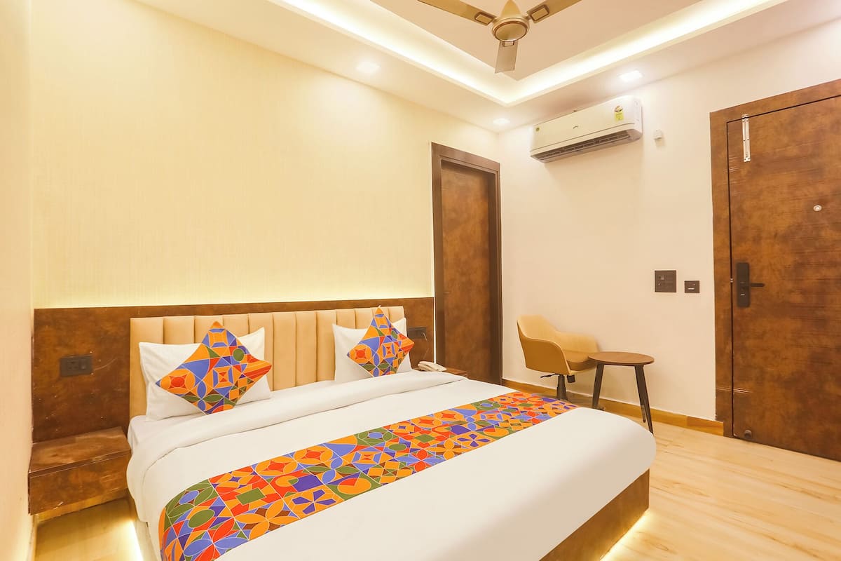 Premium kamer | Lakens van Egyptisch katoen, luxe beddengoed, een kluis op de kamer