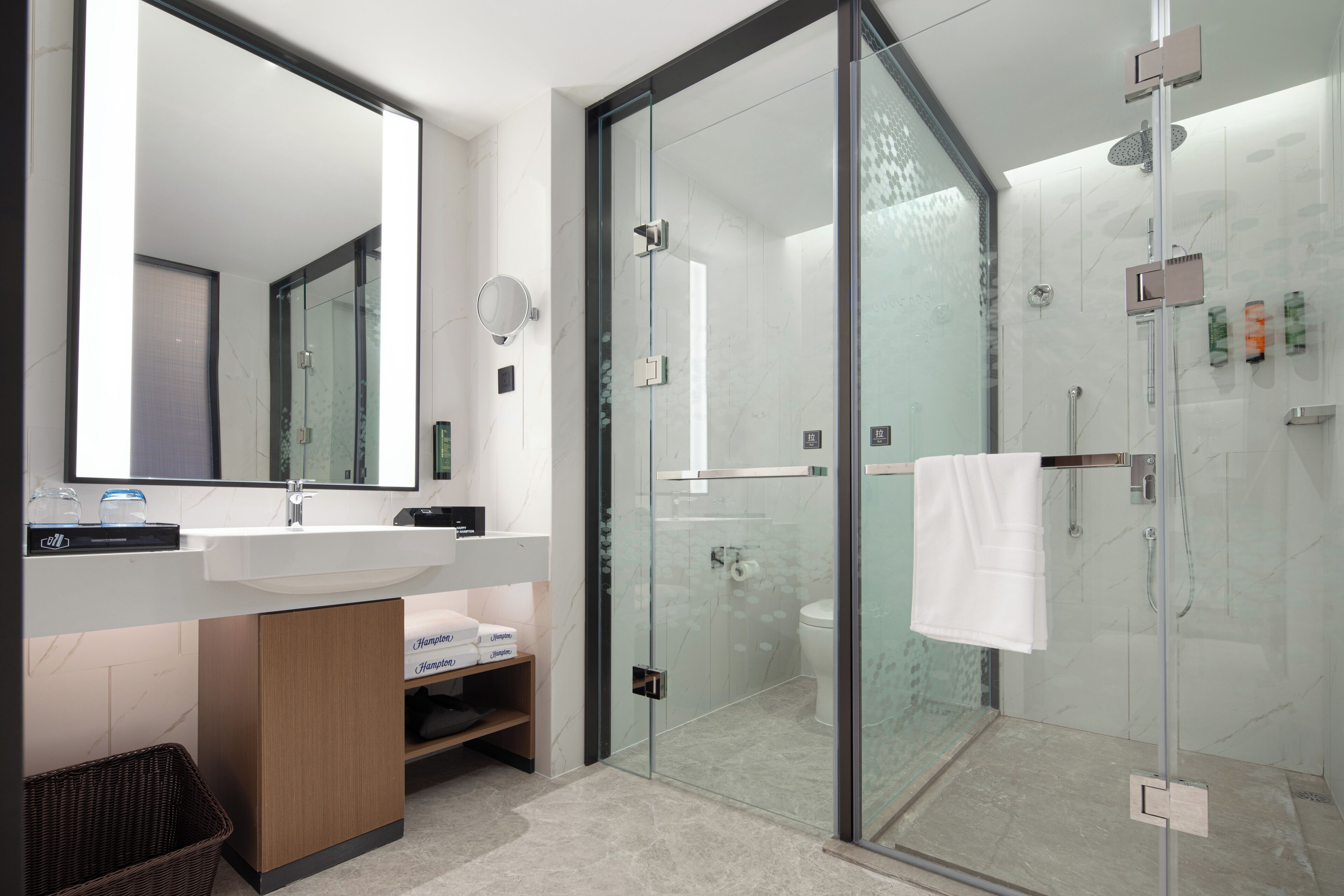 Shower, rainfall showerhead, designer toiletries, hair dryer