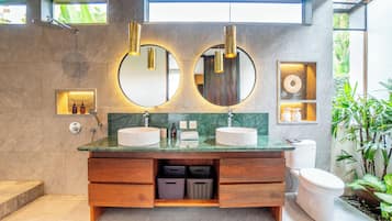 Separate bathtub and shower, hair dryer, towels, soap