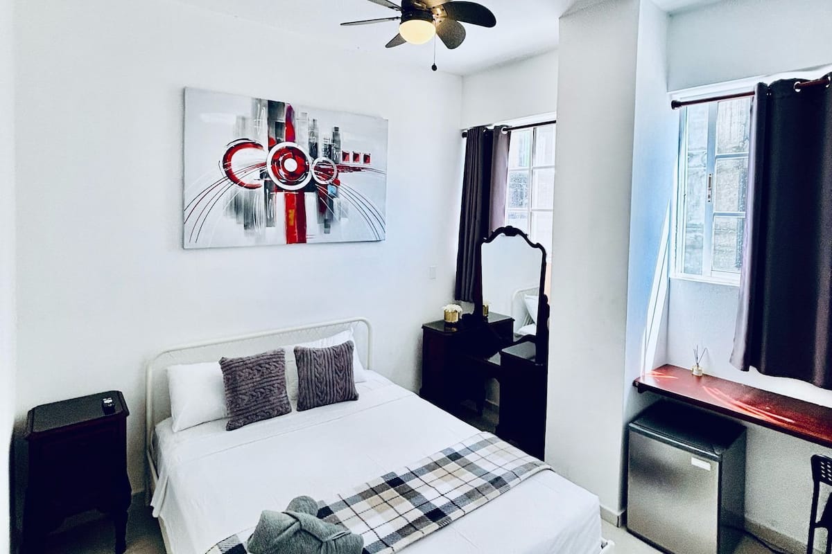 Deluxe Suite, City View | 1 bedroom, hypo-allergenic bedding, down comforters, pillowtop beds