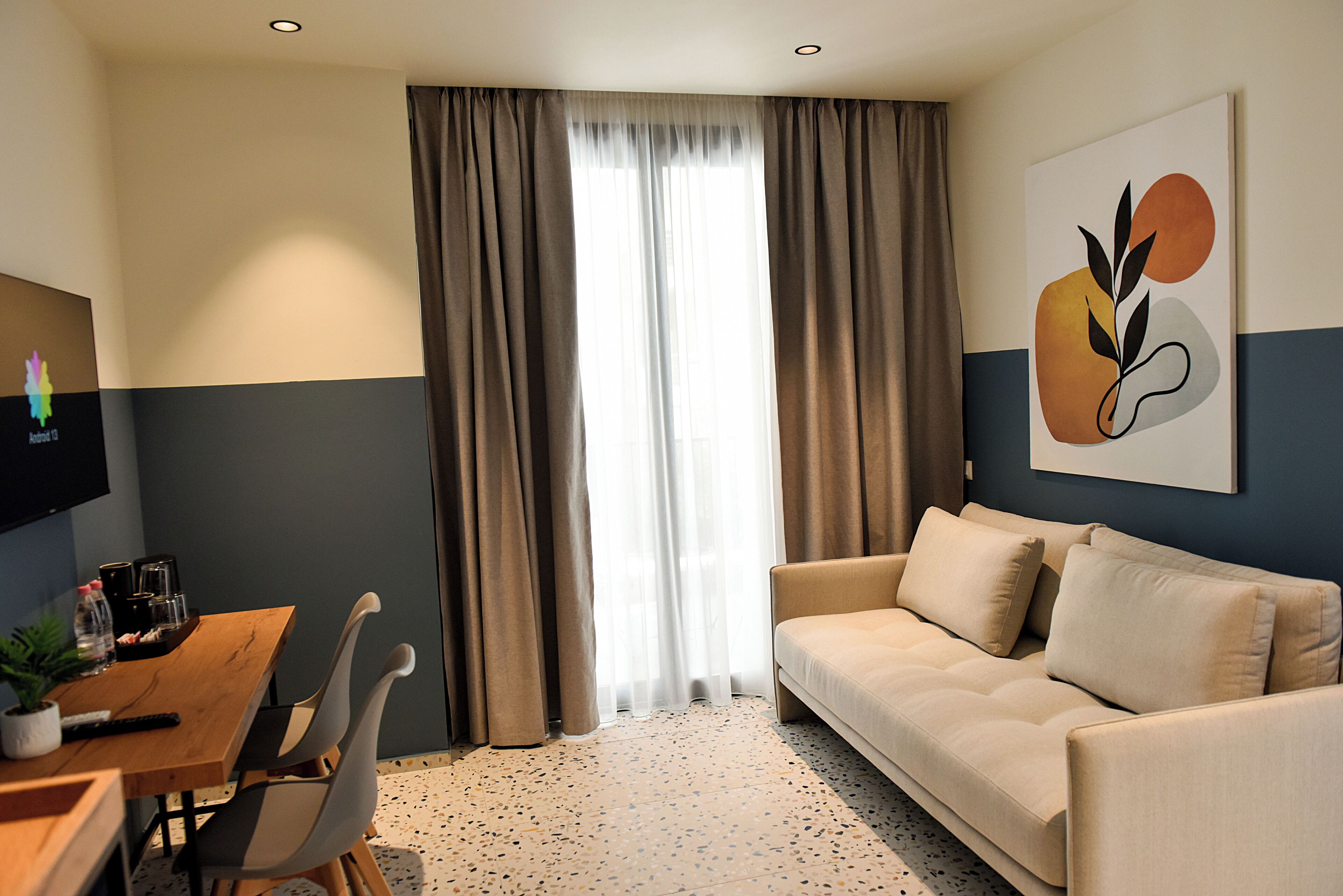 Studio – deluxe | Oppholdsområde | TV