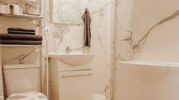 Shower, towels, soap, shampoo