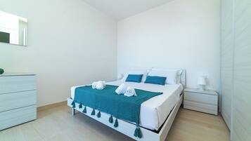 2 habitaciones y ropa de cama