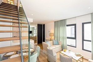 Apartamento, 3 quartos | Área de estar | Smart TV