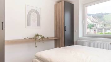 1 slaapkamer, een strijkplank/strijkijzer, reisbedje, wifi