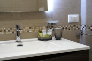 Shower, bidet, towels, soap